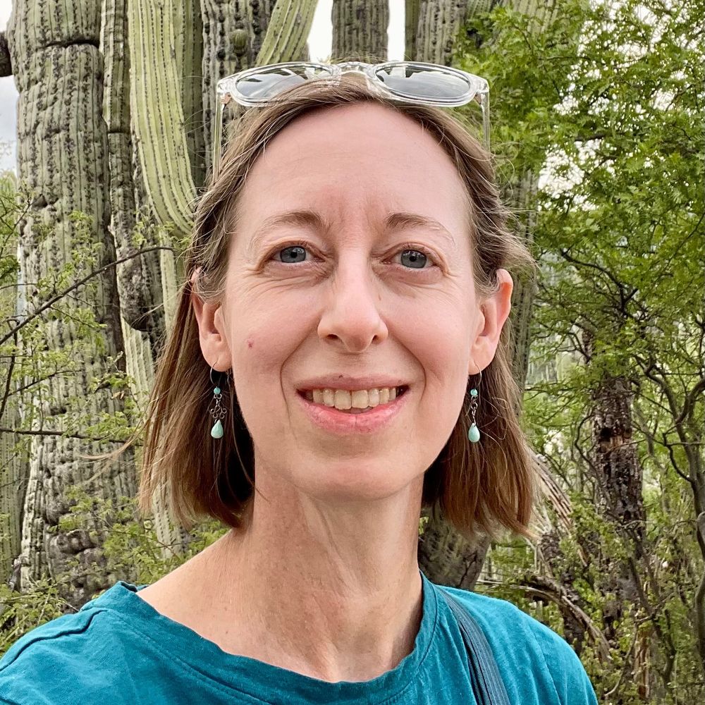 Melinda M. Mangin (she/her/ella)