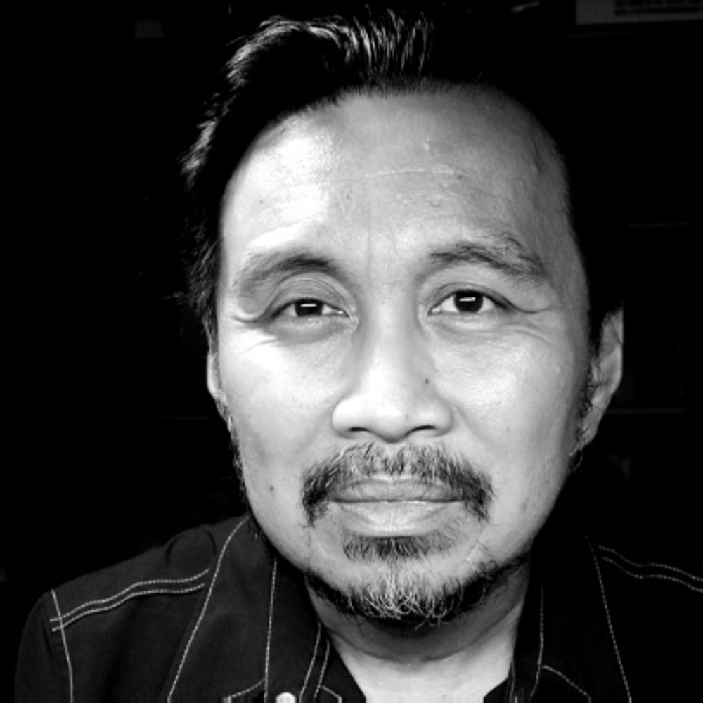 John M Flores