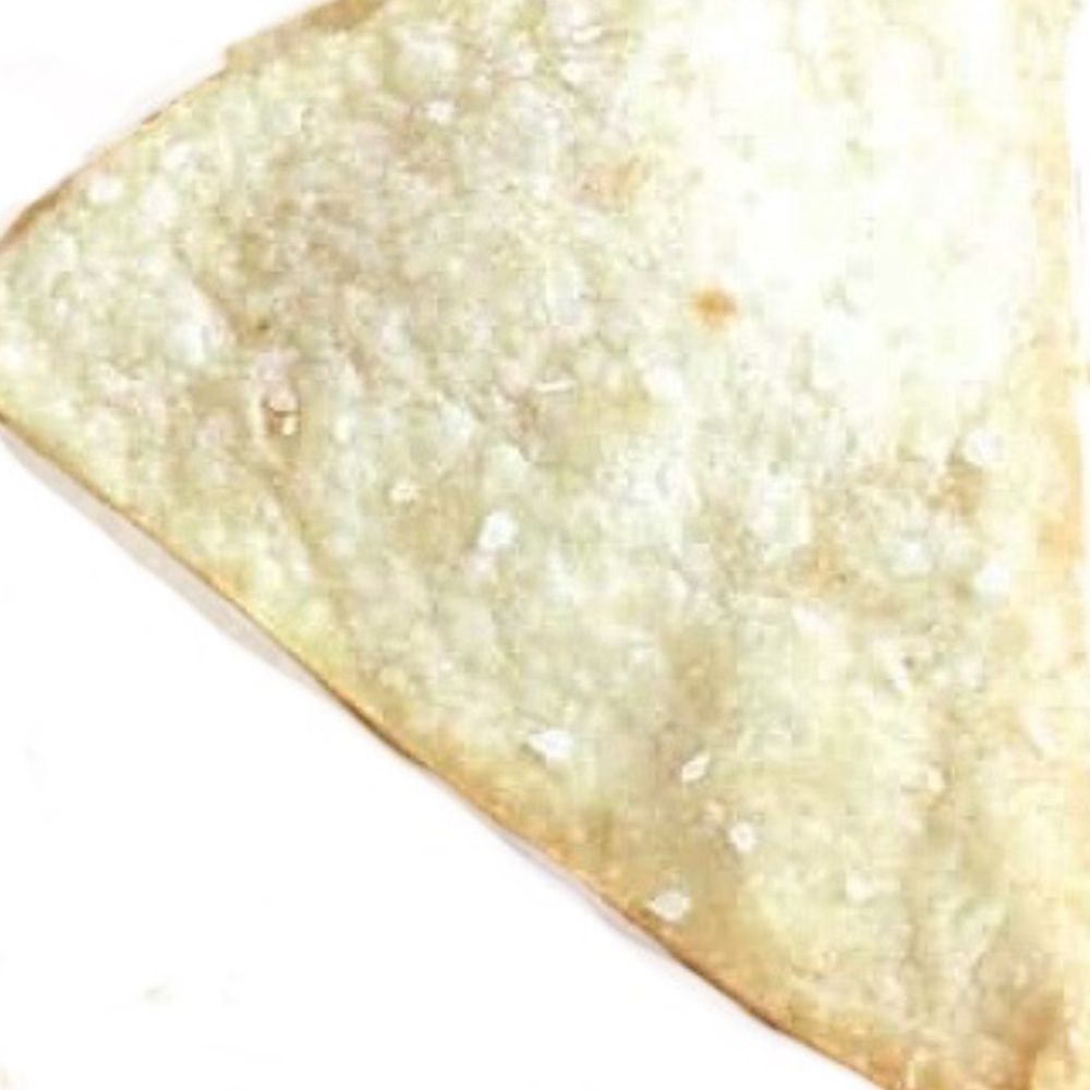 A hand-made tortilla chip in a world of Pringles.