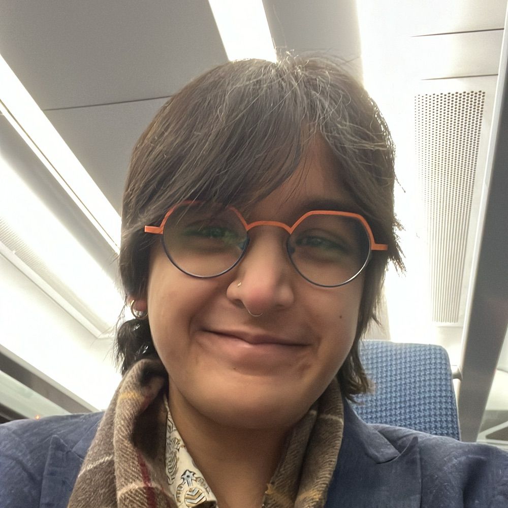 Shreya Dube (they/them)