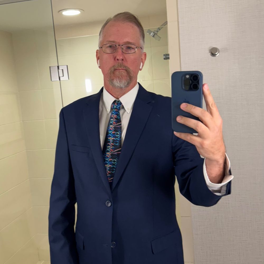 Greg M. Johnson