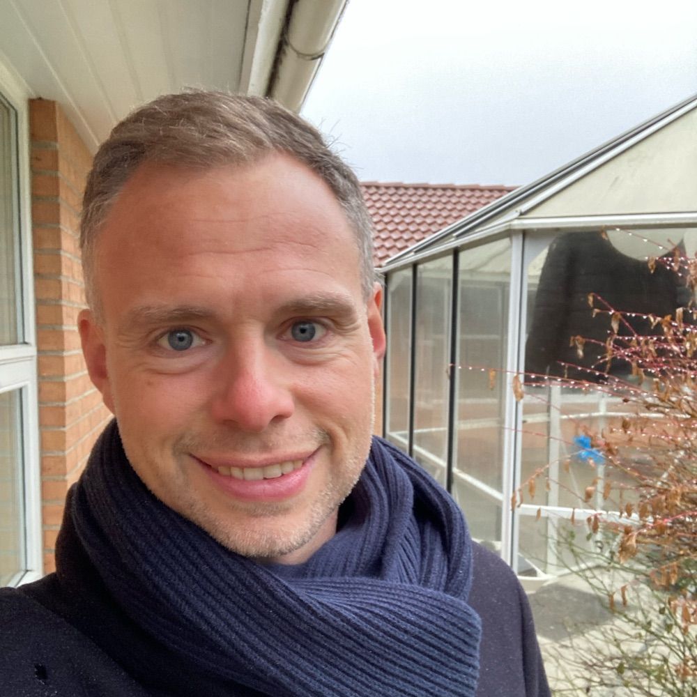Thomas E. Holm