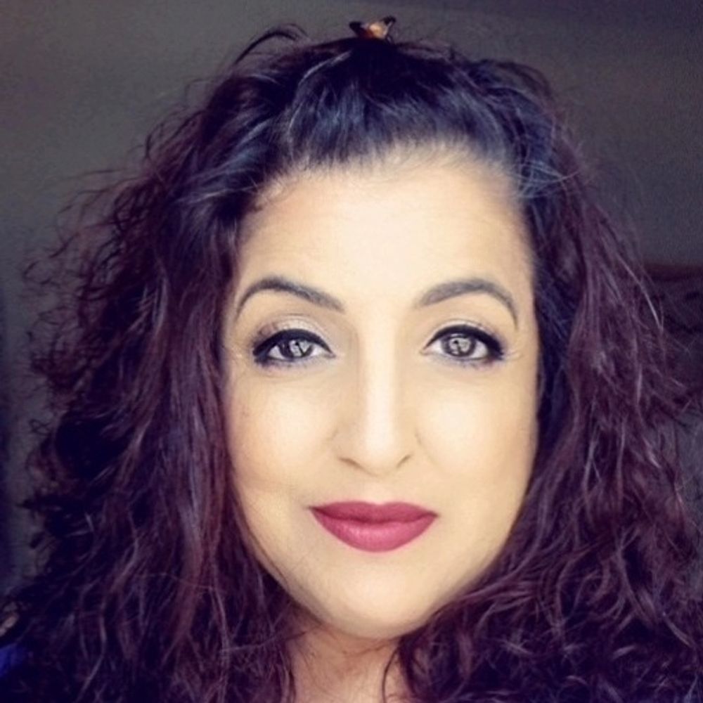 Dr. Aneela B