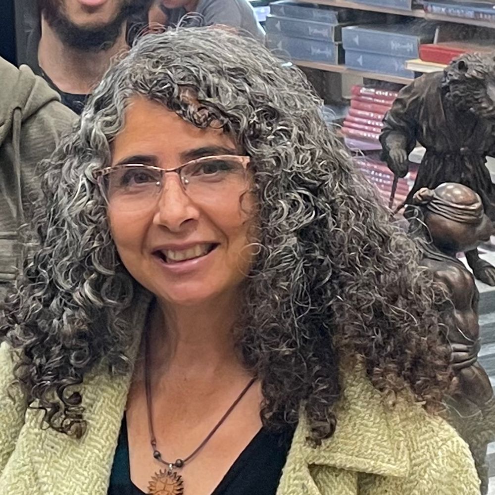 Isabel Espinal, PhD, MLIS