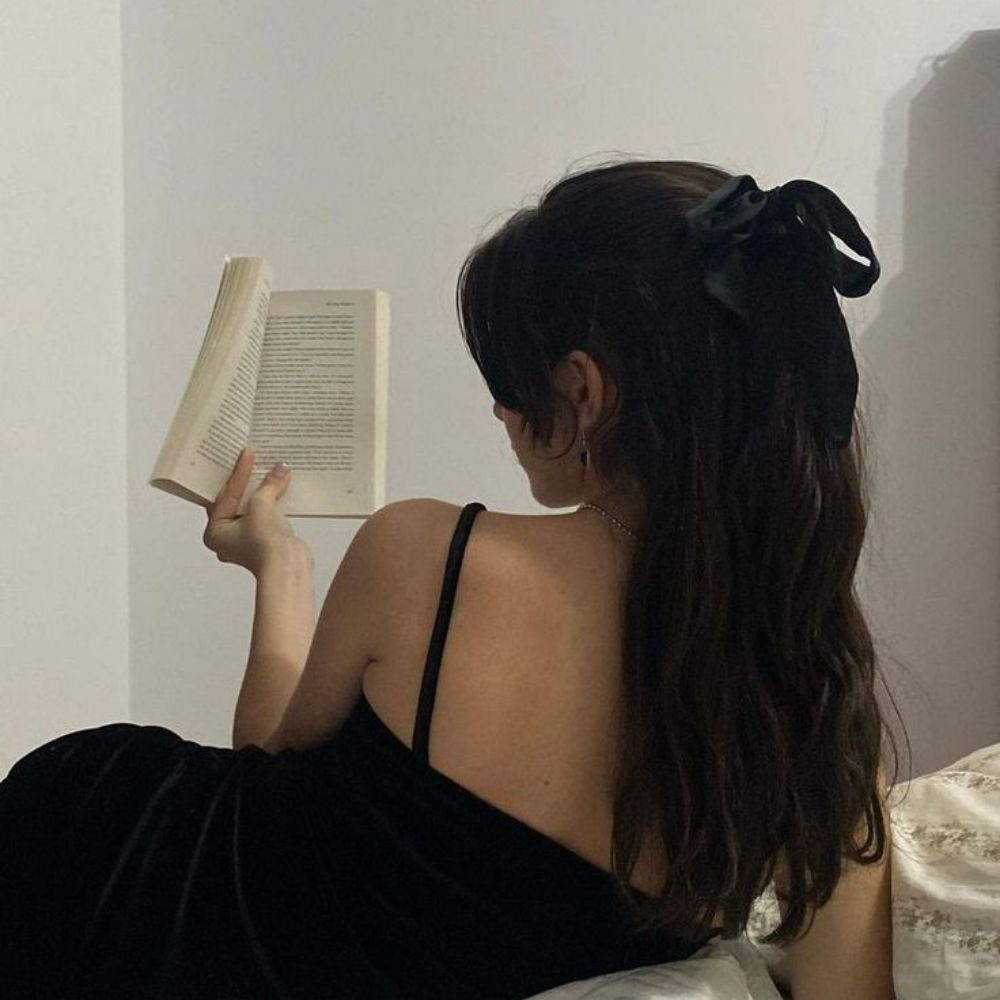 Lia 📚 Está lendo📖