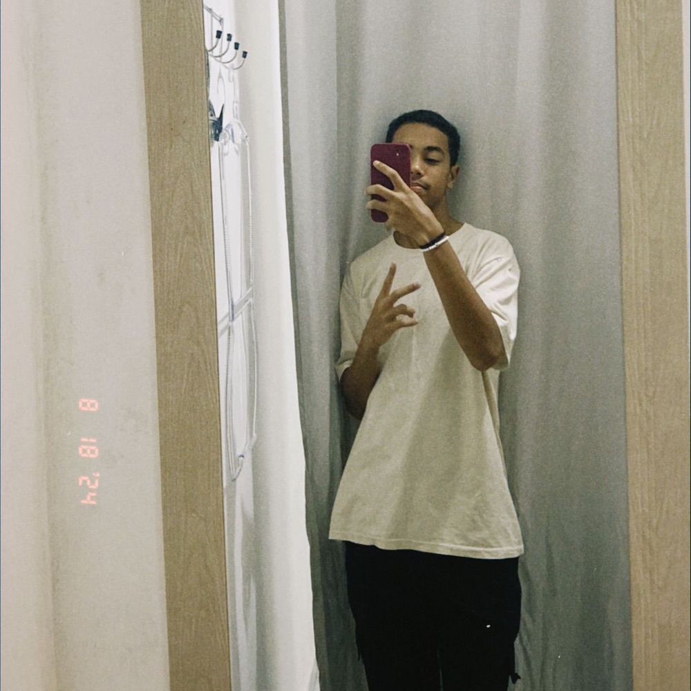 L.