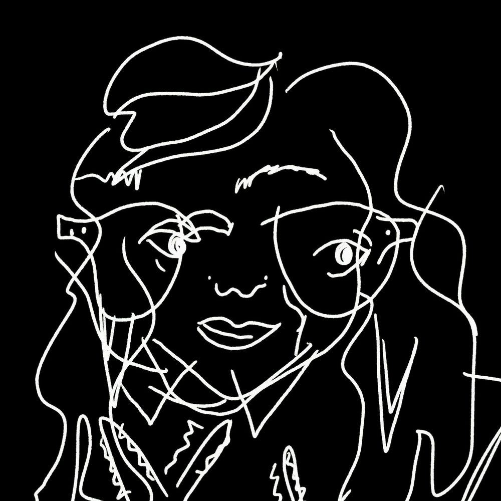 Tall portrait of a woman in her mid-thirties with long hair buzzed on one side, wearing a purple blouse, glasses, and a smile.