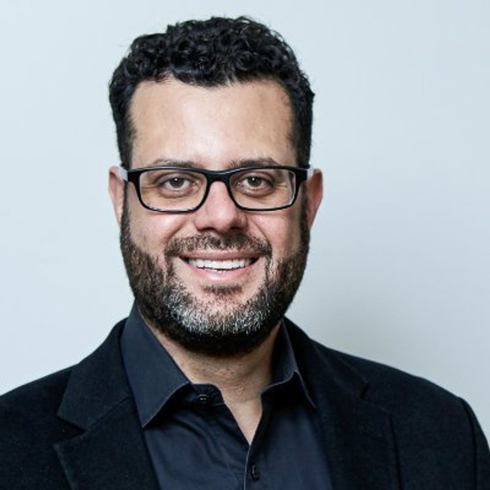 John E Milad