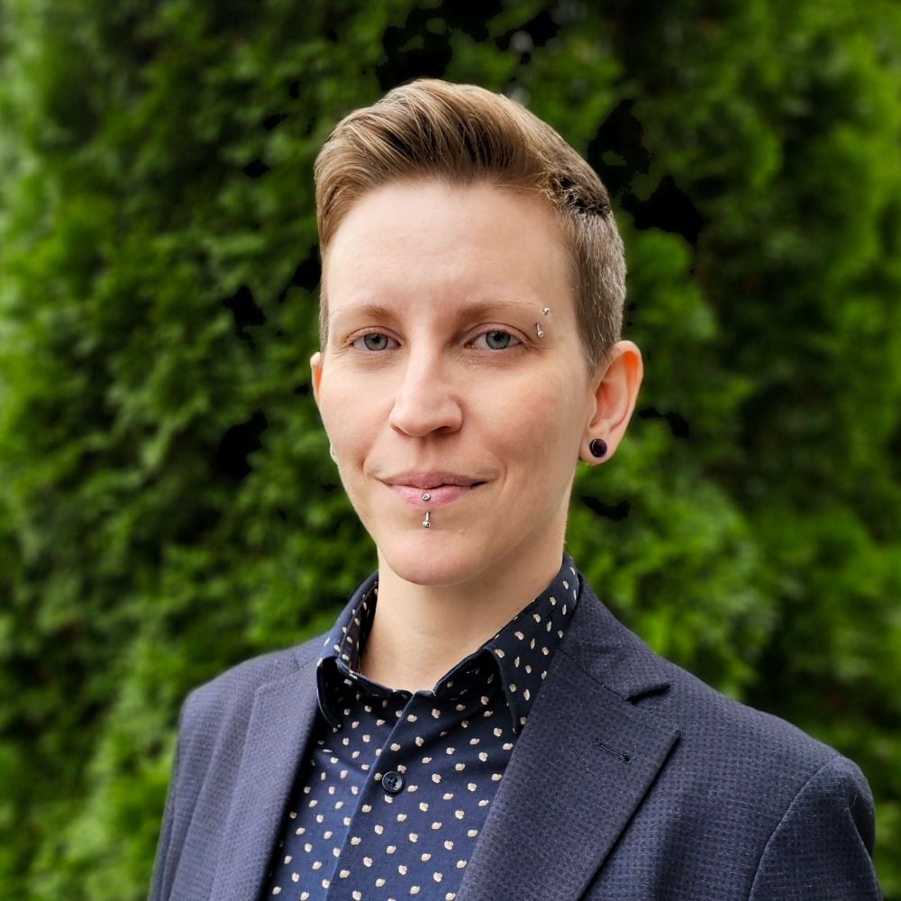 Dylan Paré, PhD (they/them)