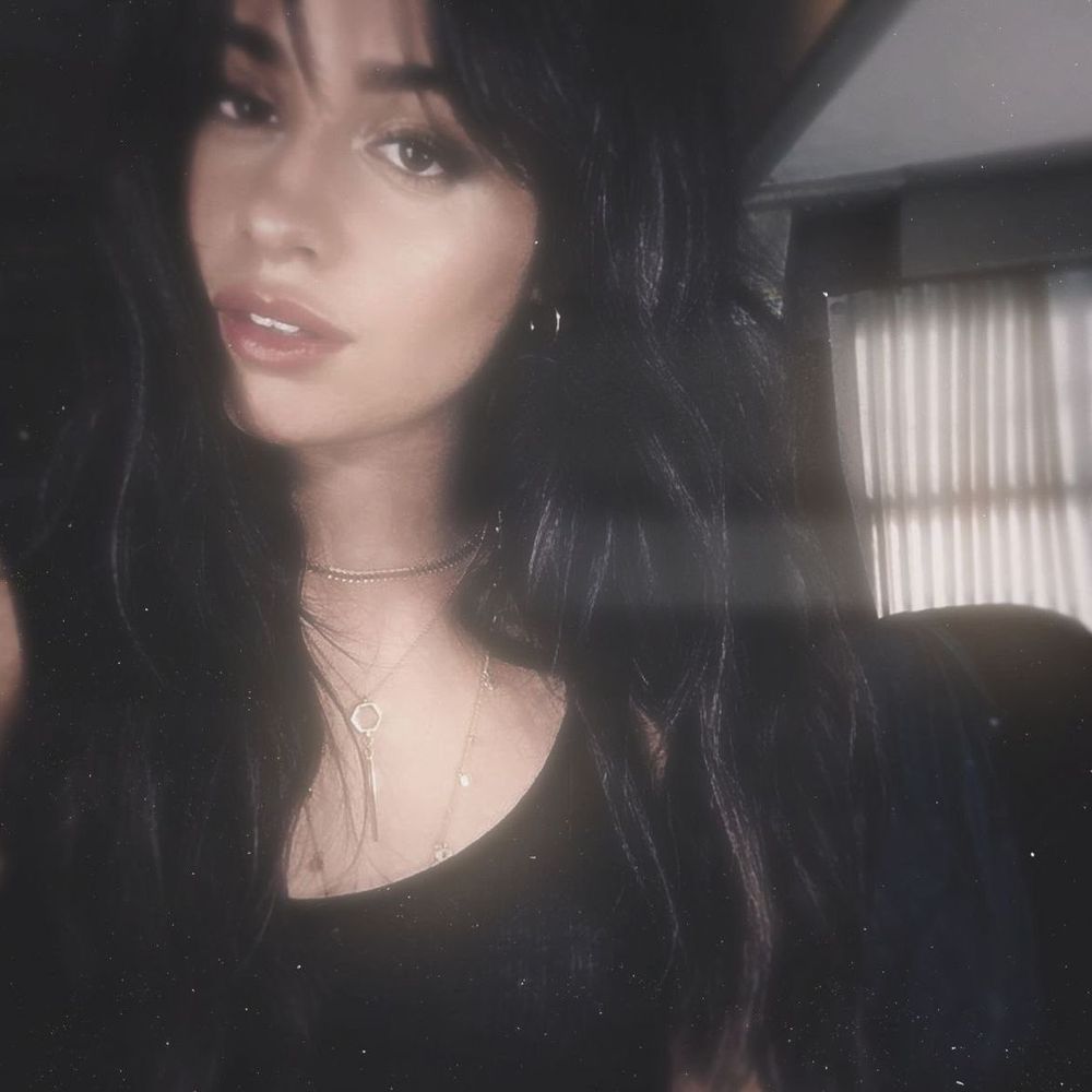 L.