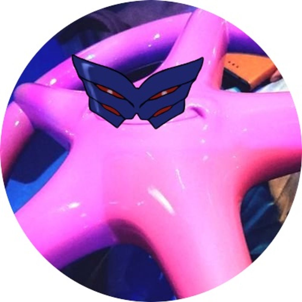 マ