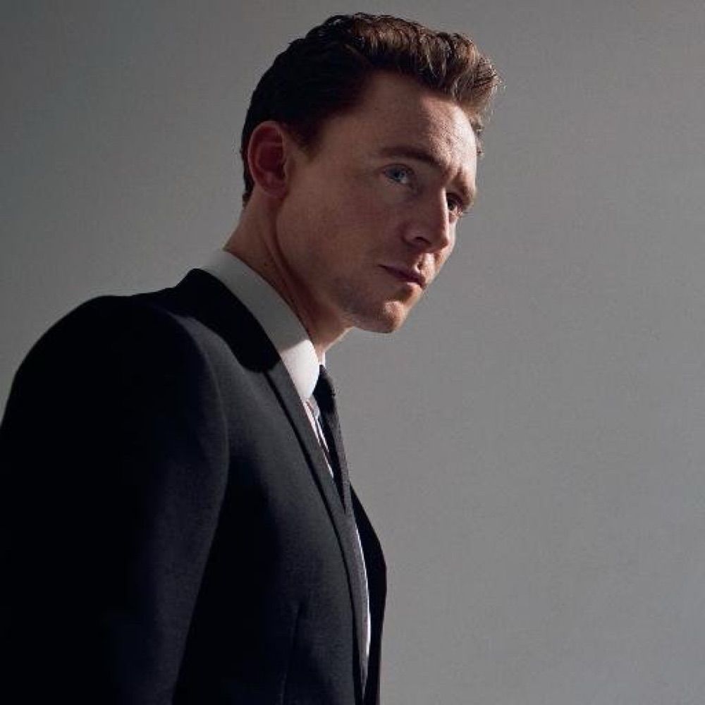 Tom God of Suits