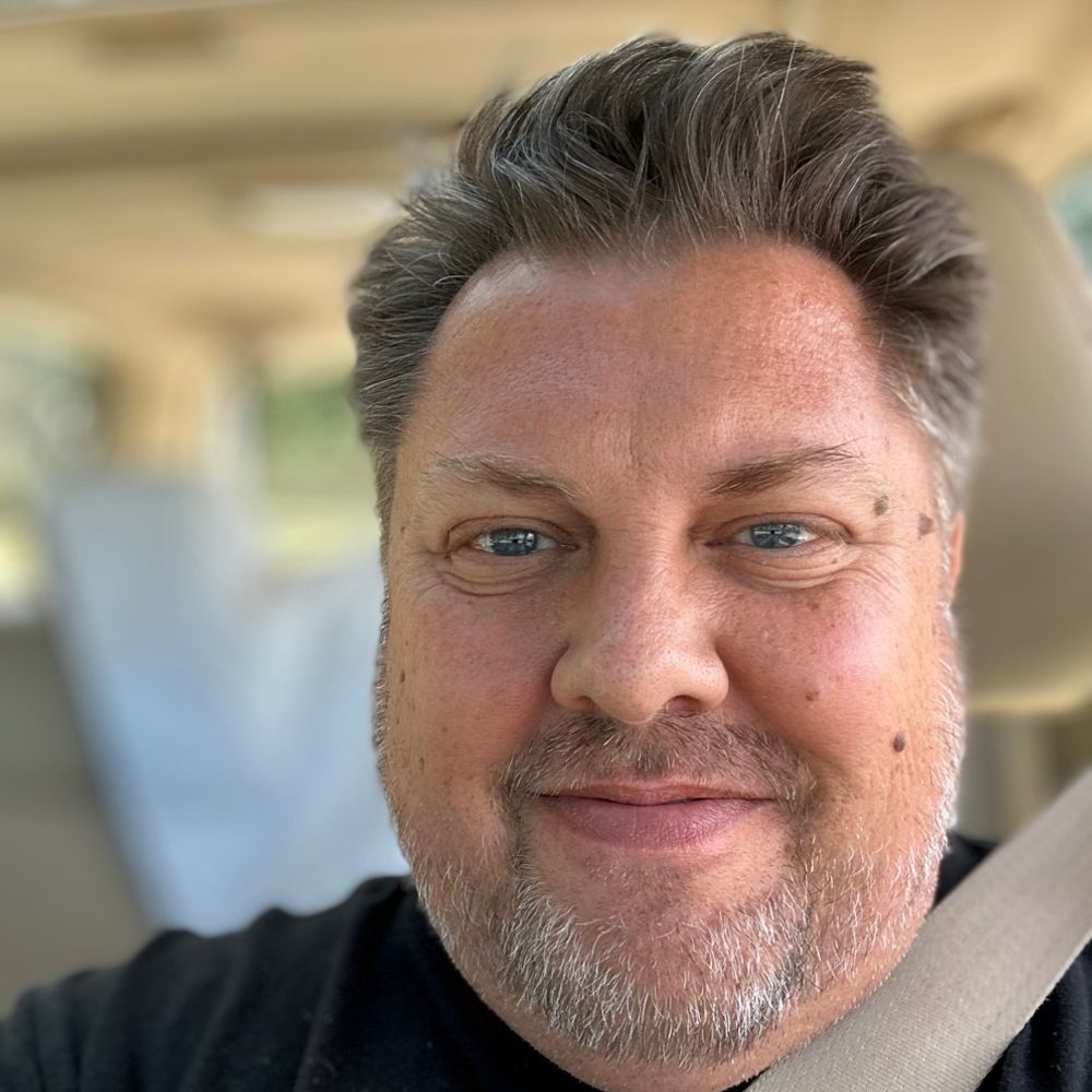 Scott J Saluga