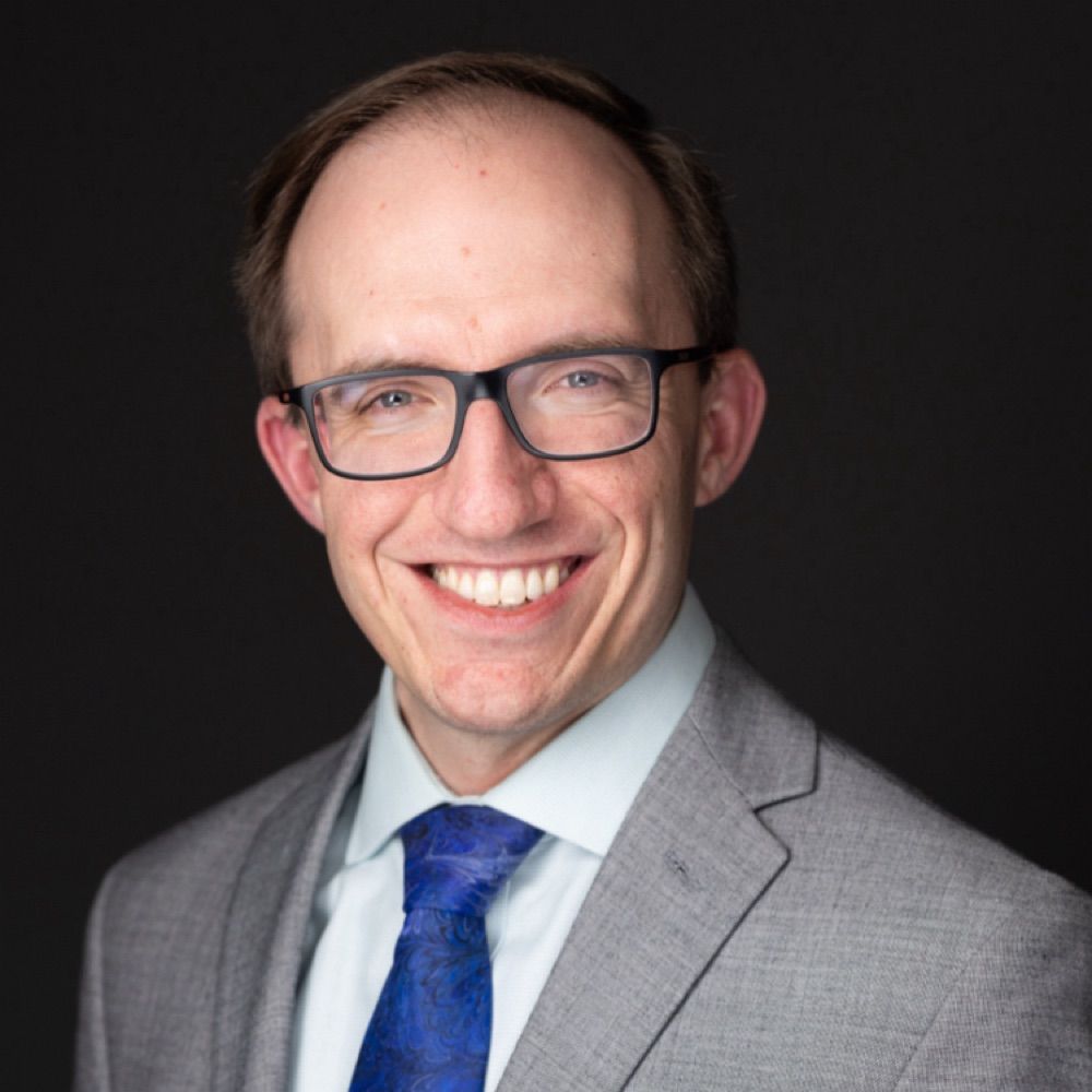 Alan L. Hutchison, MD, PhD (he | him)