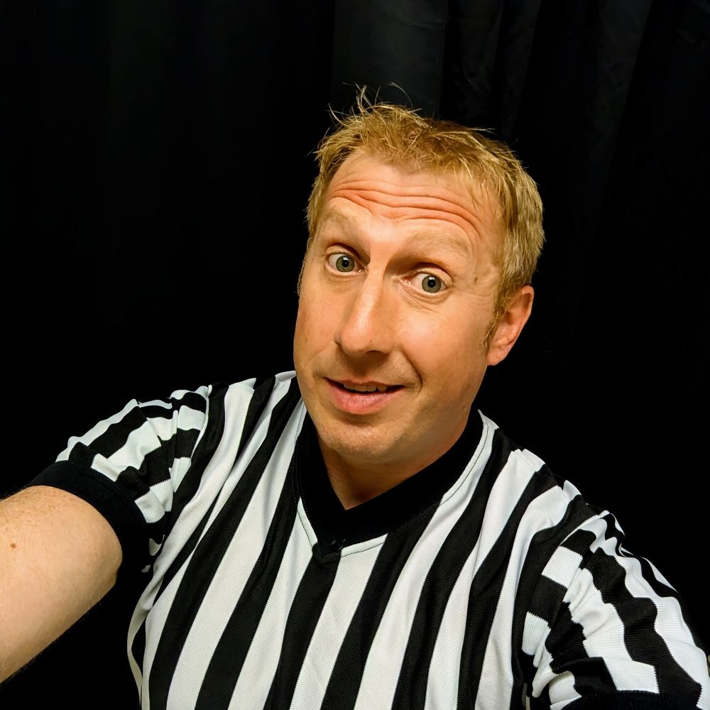 Referee Vinnie Lax