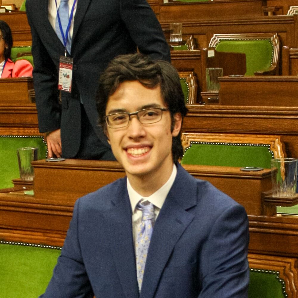 Hon. Justin Hamilton, P.C. M.P.