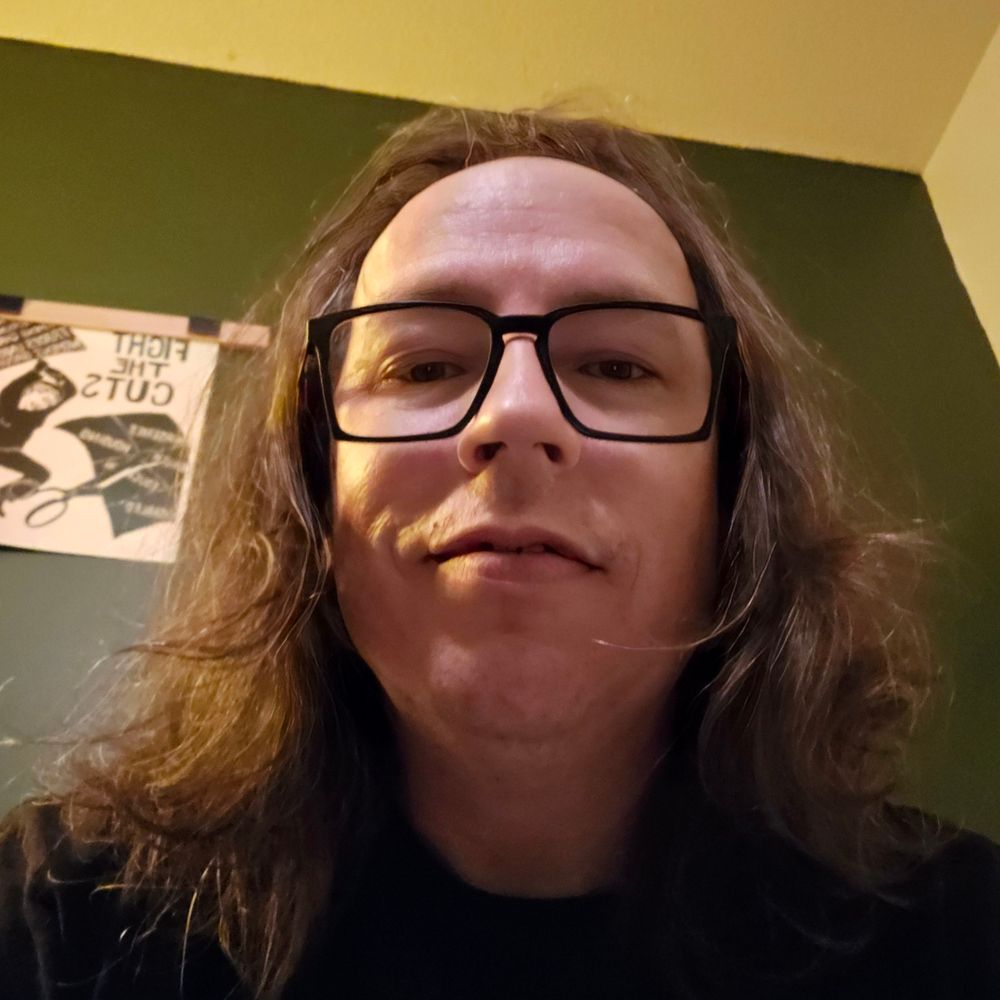 Chris (they/them)