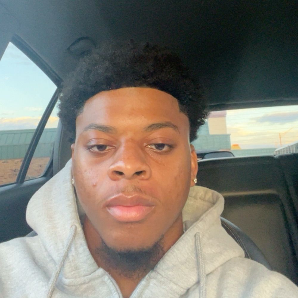 J 👨🏽‍🦯