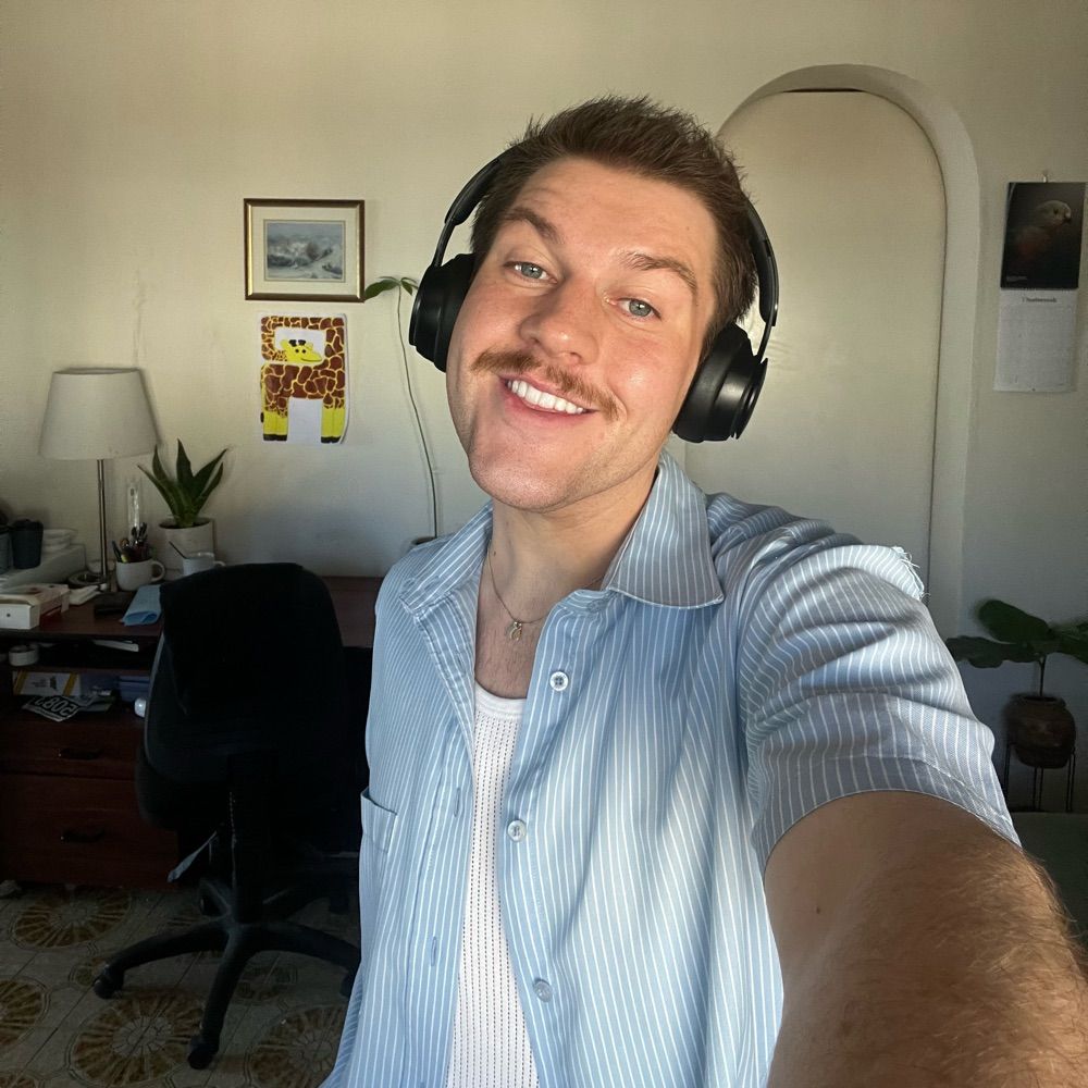 J.