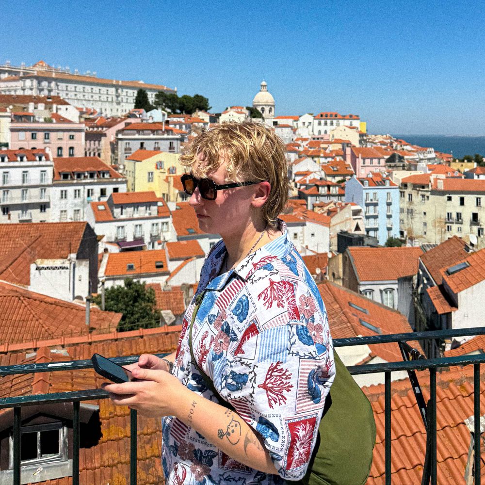 Caitlin MacKinlay (she/they)