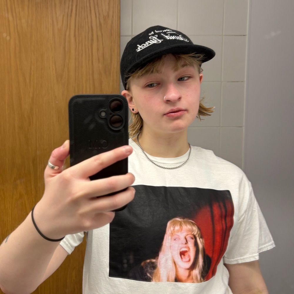 Caitlin MacKinlay (she/they)