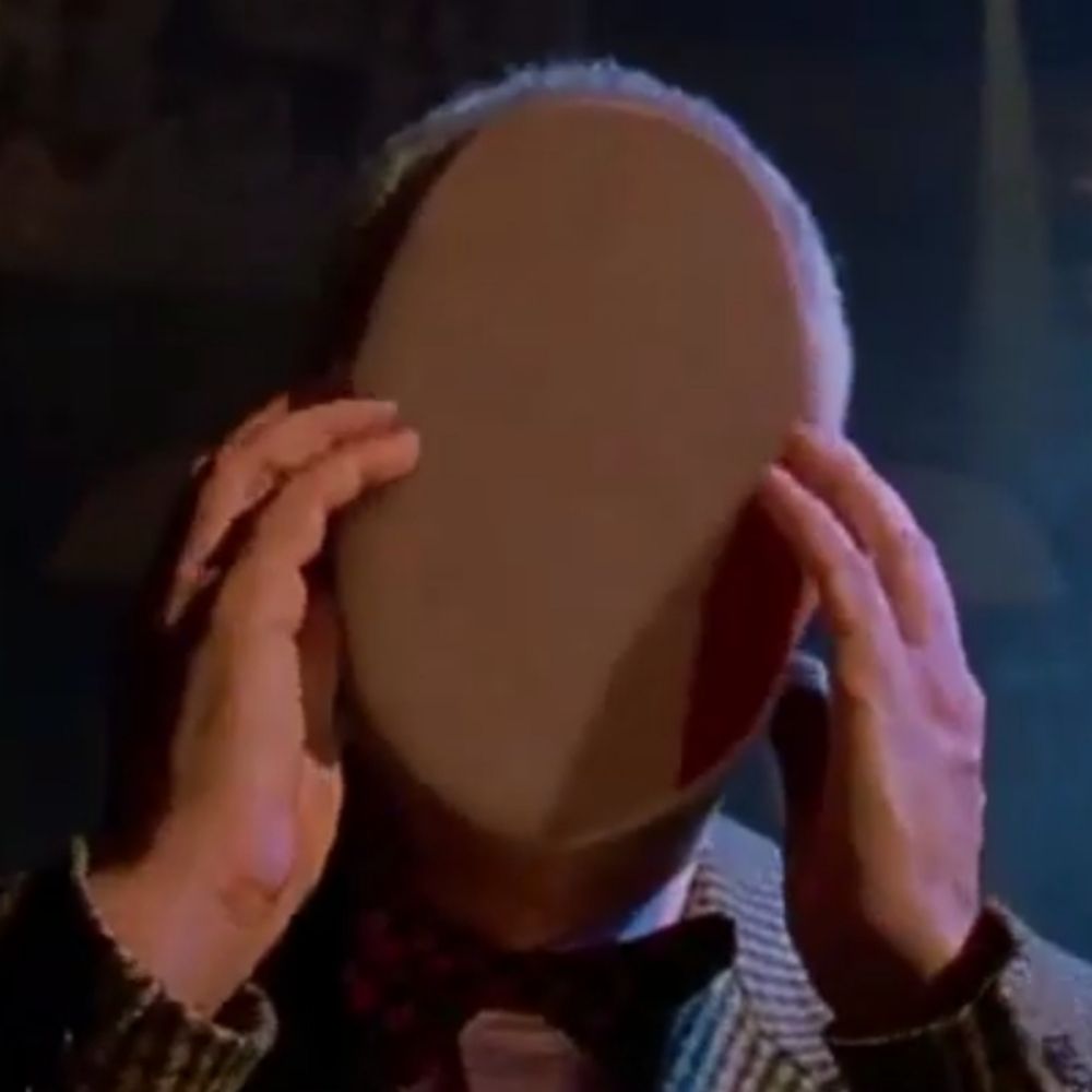 Faceless man