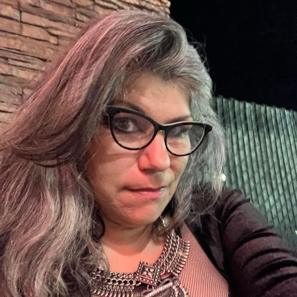 Christine Noella L