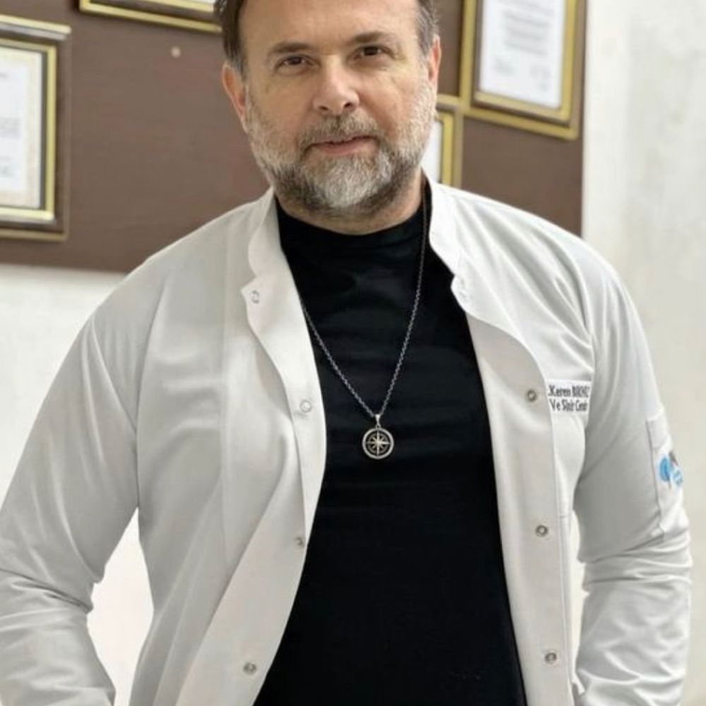 Dr Alexander M