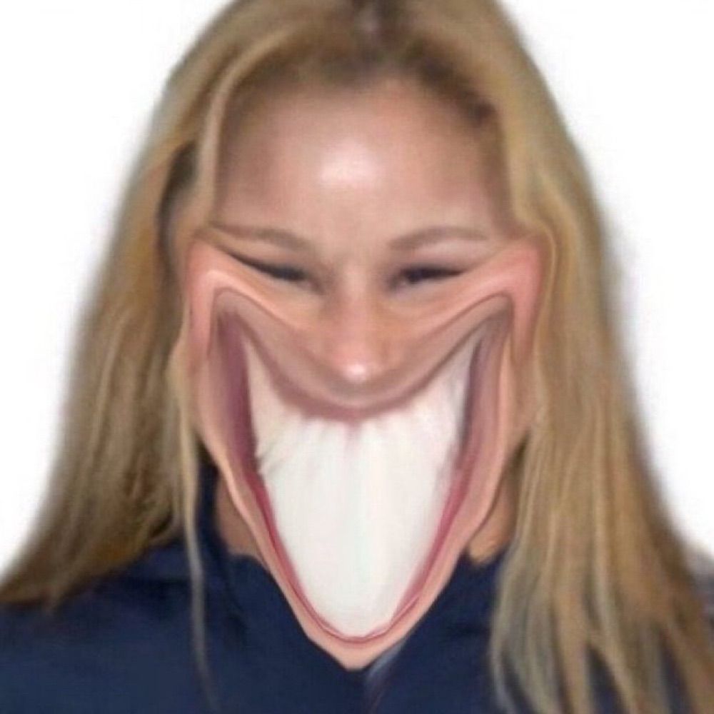 T.