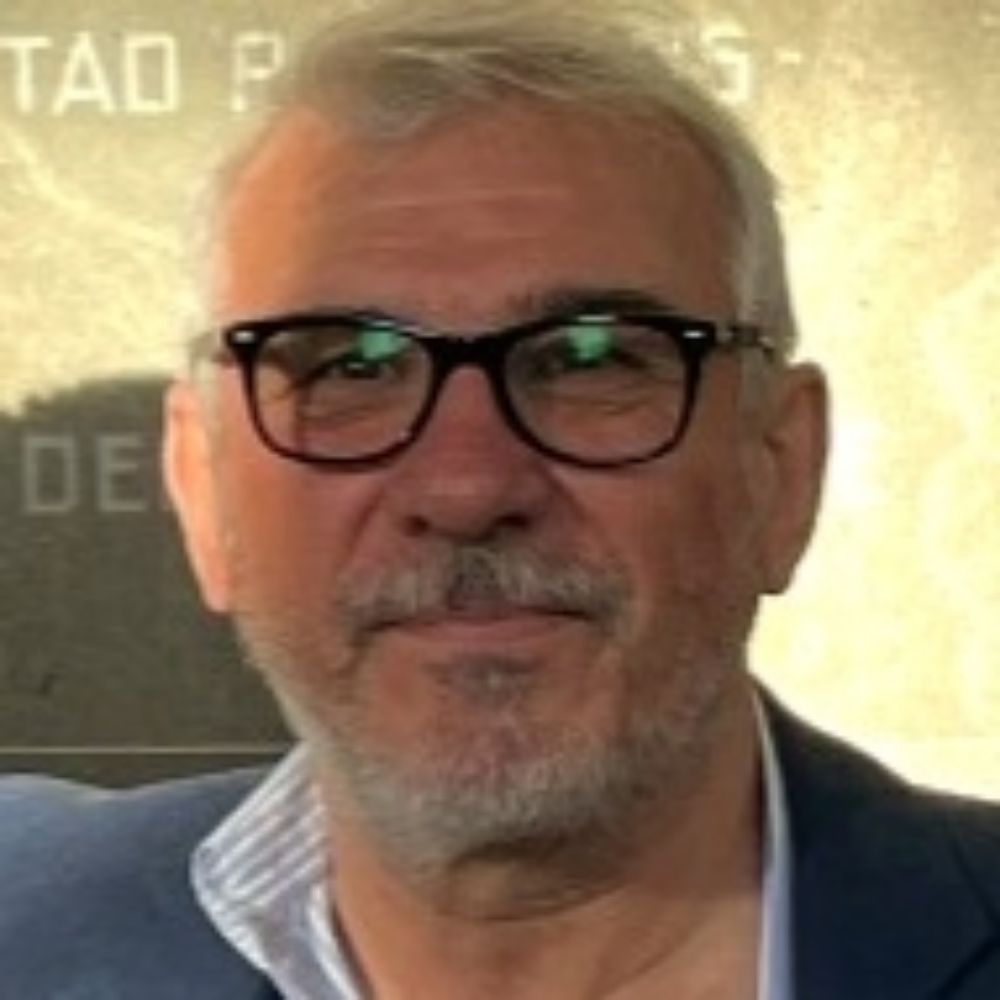 Carlos A. MANFREDI