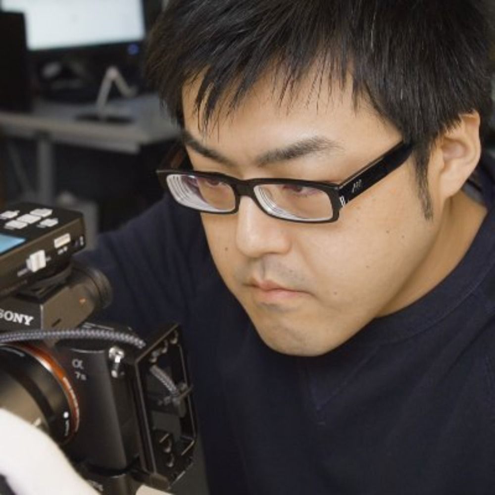 写真撮る人鈴木遥介