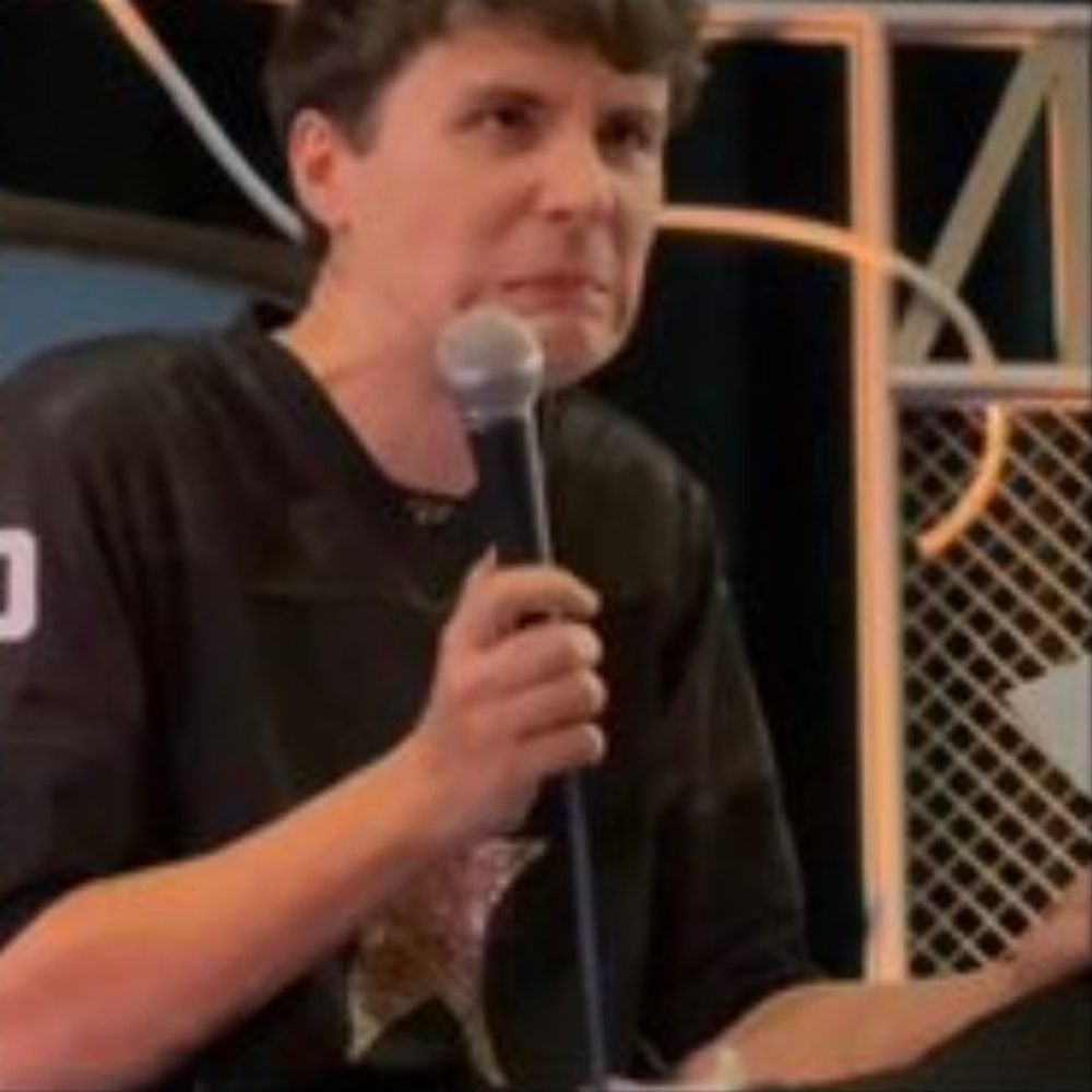 Em