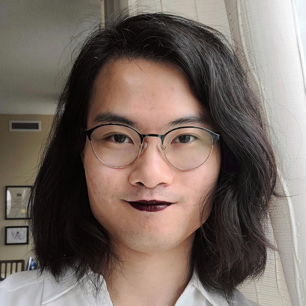 Andrew Lam (they/she)