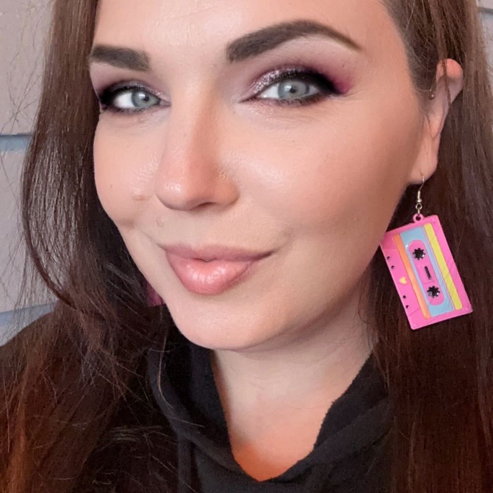 Em