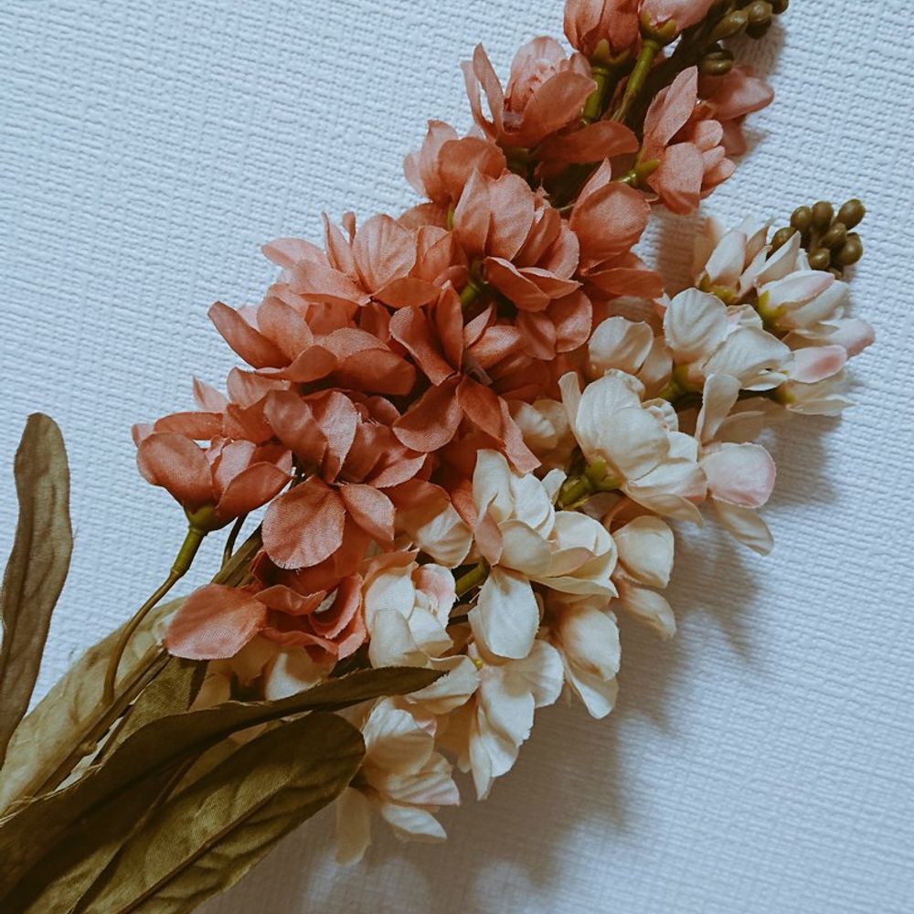 ま