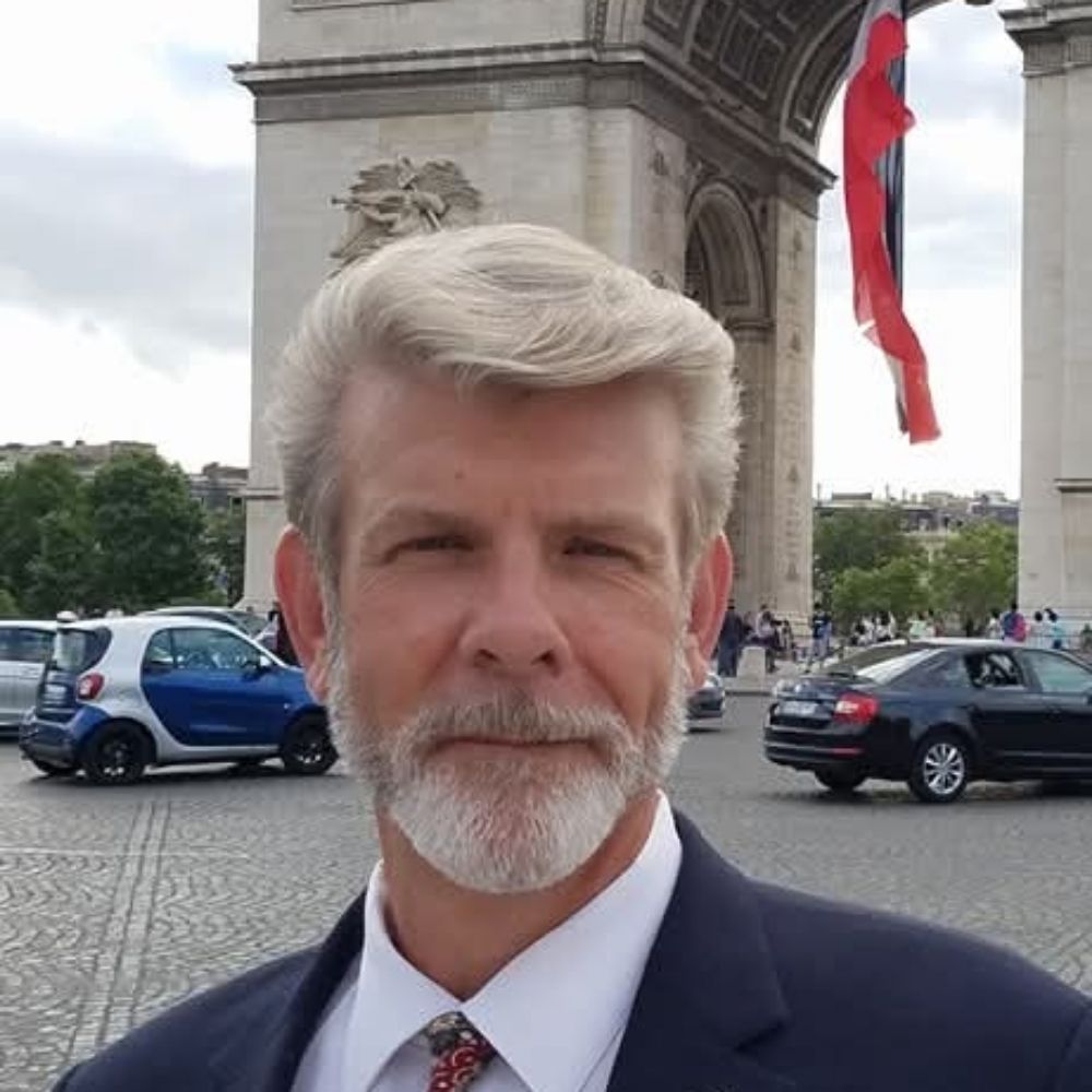 Rev. Neil