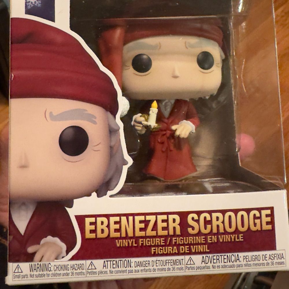 E. Scrooge