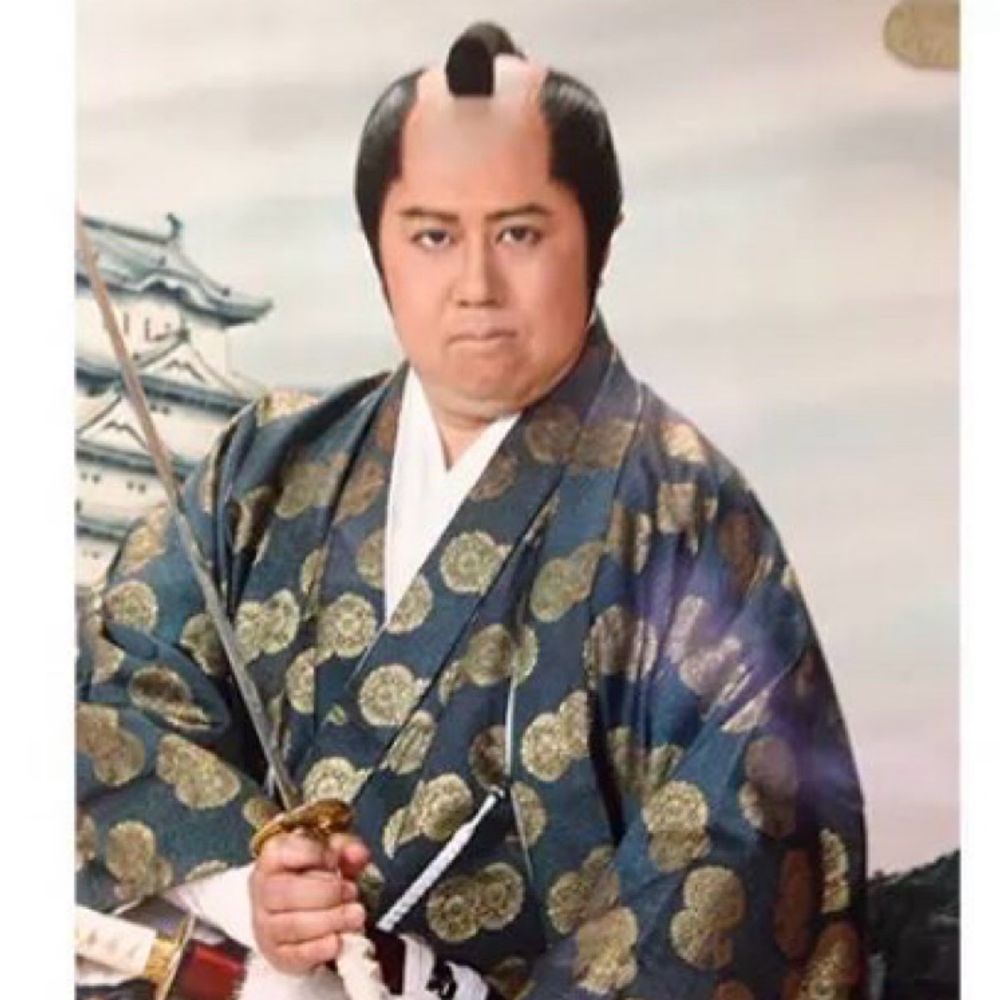 津島直人