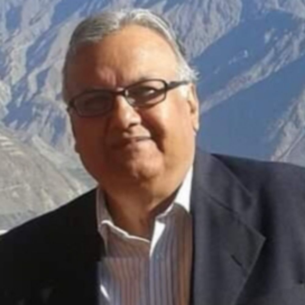 Dr. Farooq Adil