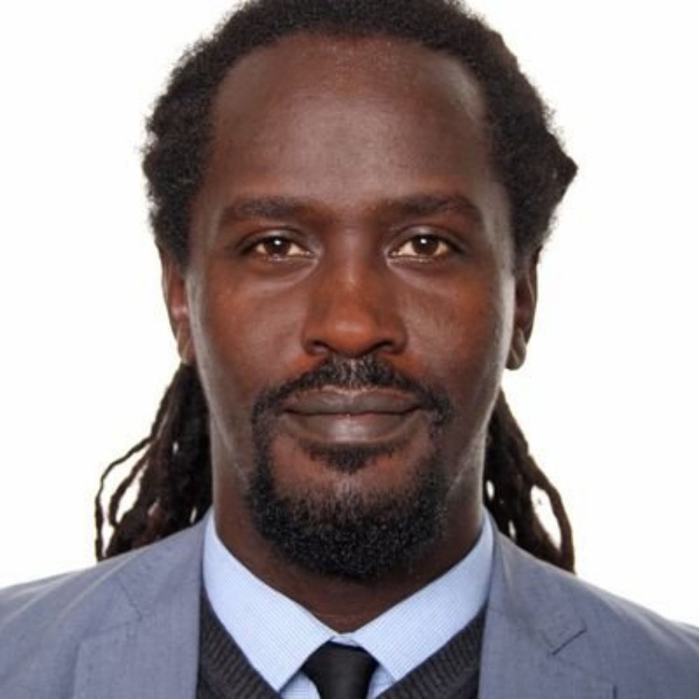 Dr. John Njenga Karugia PhD