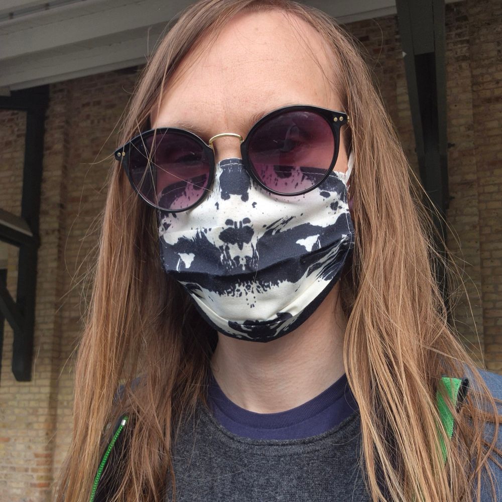 Marcus Falk (She/They)