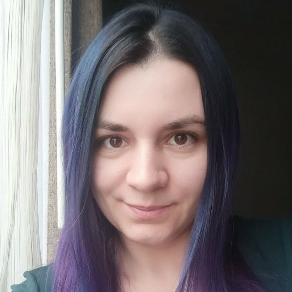 Andra Stroe (she/her)