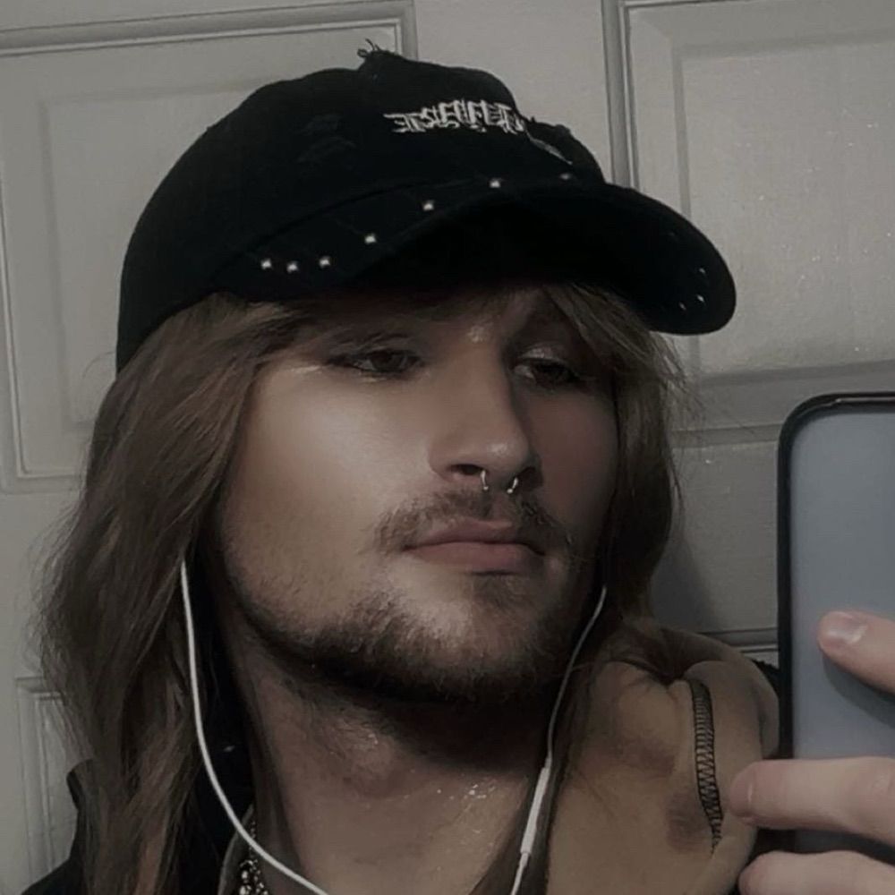 Xann Olms (they/them)