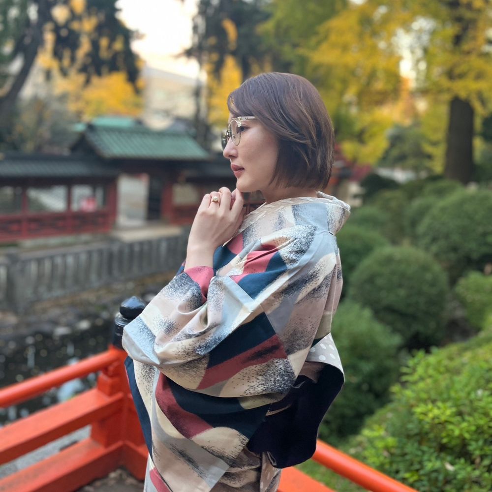 新 麻記子