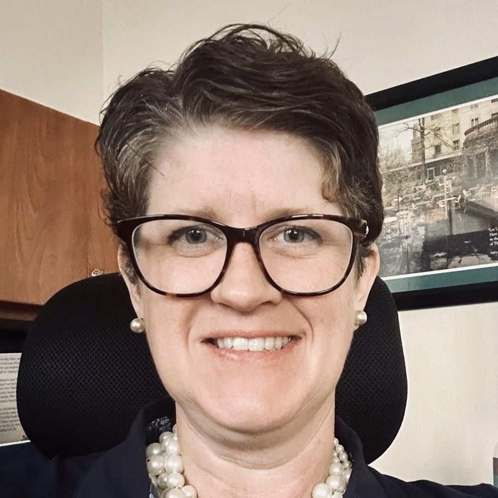 Dr Jill Underly