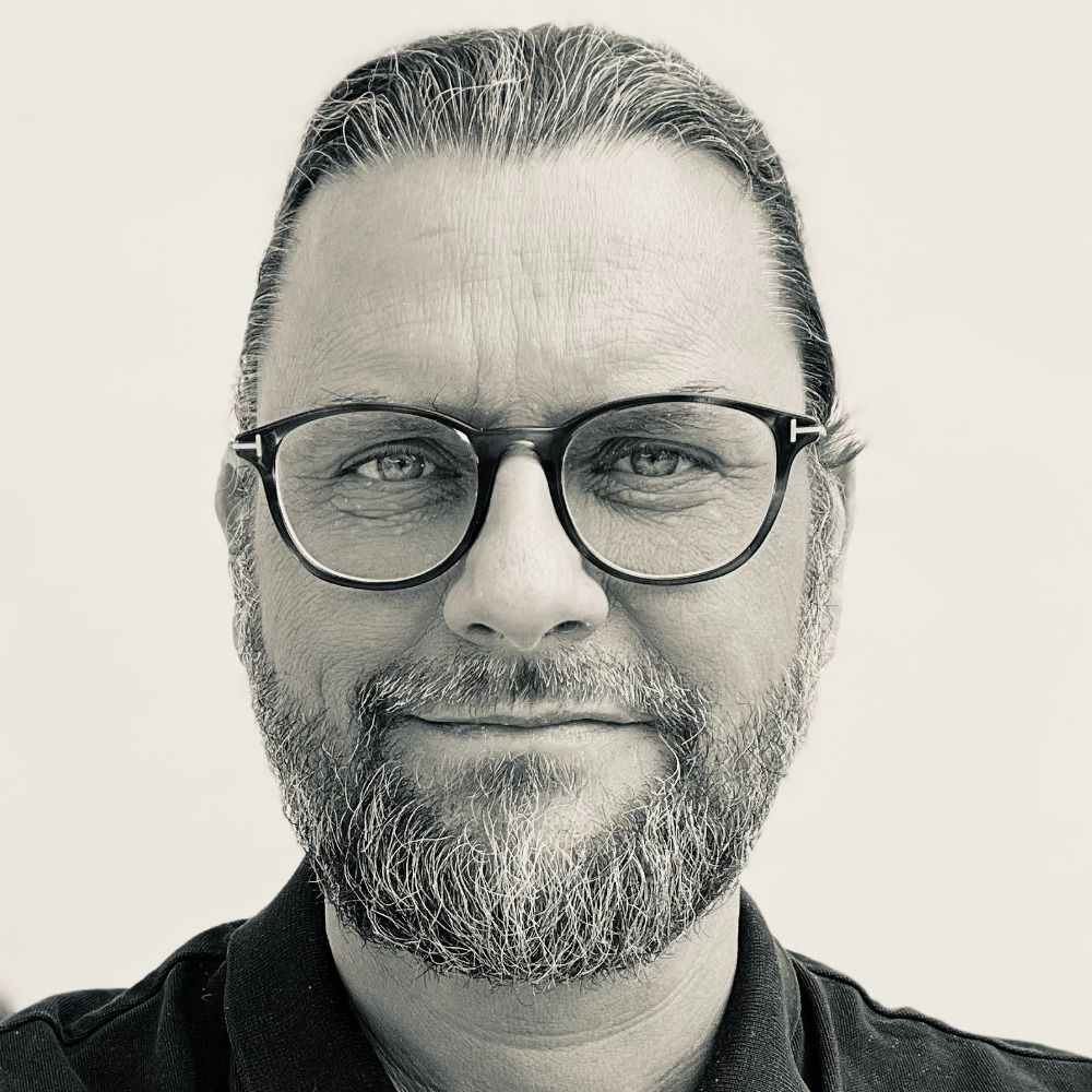 Joerg M.