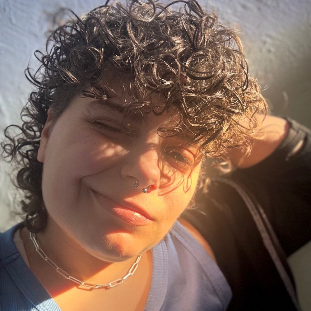 Curlsrock (She/They)