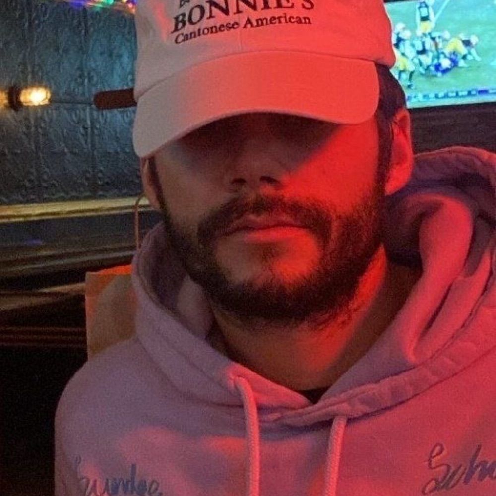 K.