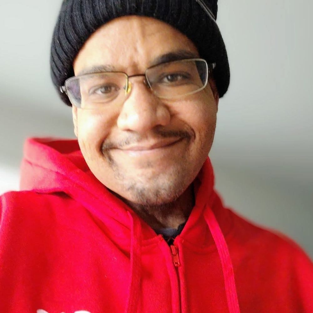 Clayton M. Davis (he/they)