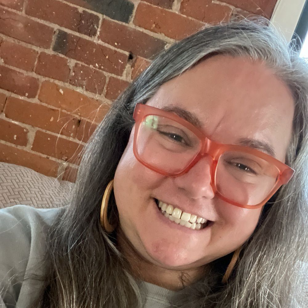 Lizzie Fortin (she/they)